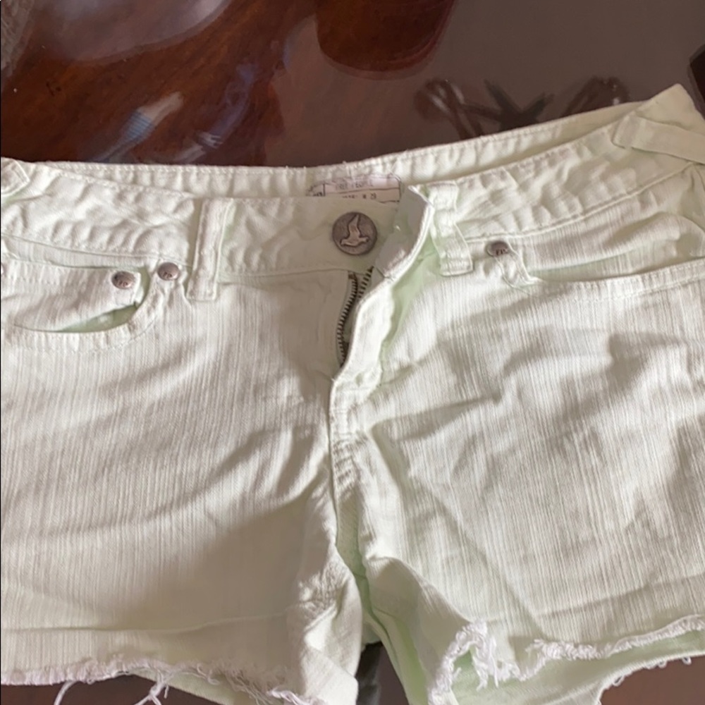 Free people light green cut off shorts